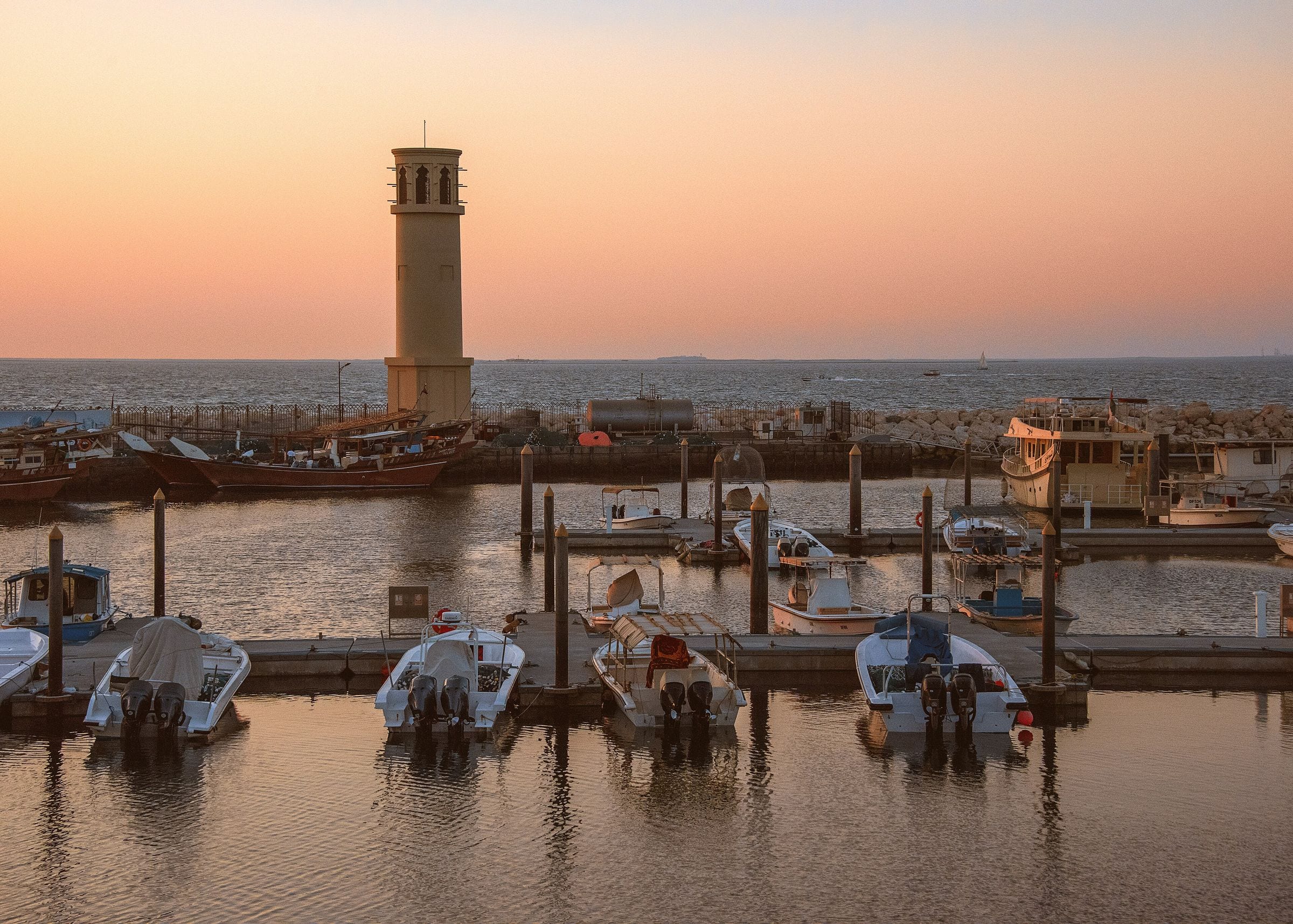 Fishing boats moored at Jumeirah fishing harbour at sunset