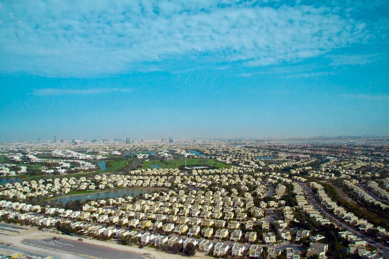 Aerial view of the villas and lakes of The Meadows in Emirates Living